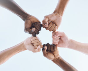 team-and-below-hands-of-men-in-support-of-2026-03-25-06-34-44-utc
